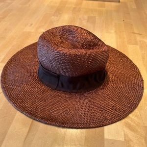 Banana Republic Brown straw hat with a brown ribbon, size small, brand new.